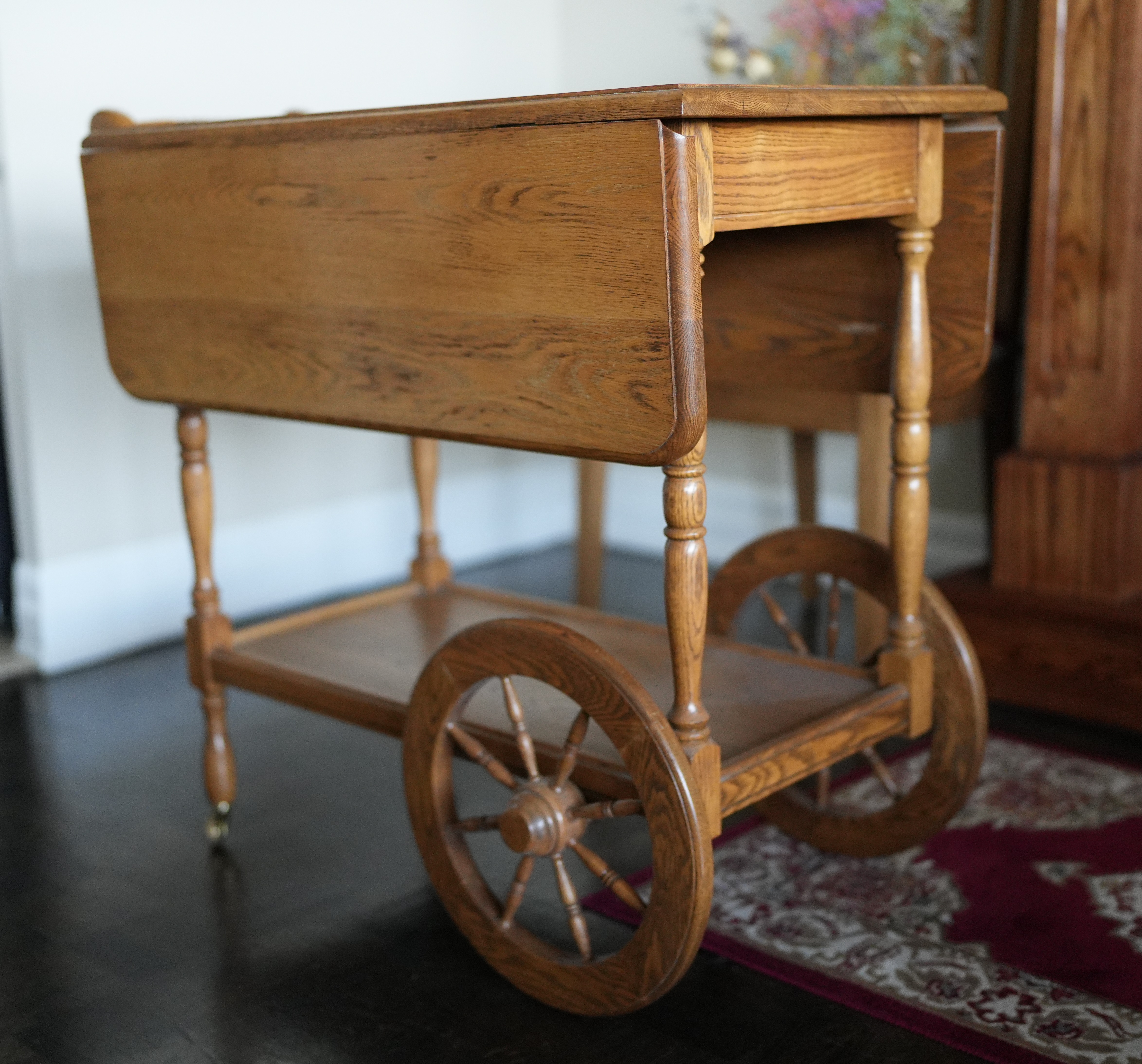 The rounded-edged wooden tea cart Timothy crafted