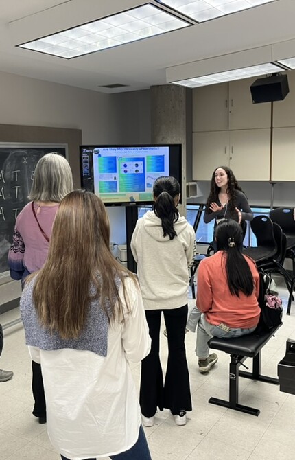 Student presenting their work to audience
