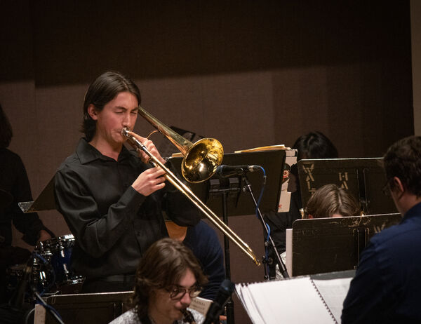 Isaac Kashino solos on trombone in a performance with the U of T Jazz Orchestra in Walter Hall.