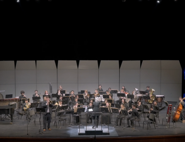Dominic Ghiglione performs a concerto as the soloist with the U of T Wind Ensemble.