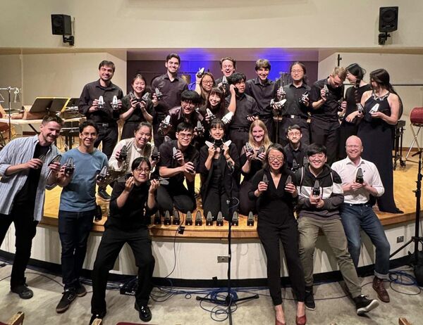 U of T Percussion students and Faculty pose for a group picture following a performance in Walter Hall.