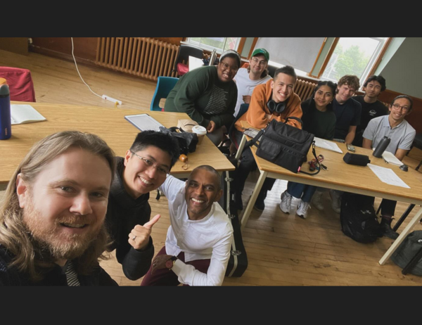 A group photo taken from the 2024 Lunenburg Composition Academy in Nova Scotia where Roydon Tse is on faculty. Roydon currently co-directs the annual summer academy with good friend and fellow U of T composer Matthias McIntire (D.M.A 2020). The photo also features several U of T students and alumni, including award-winning composer/conductor Dinuk Wijeratne.