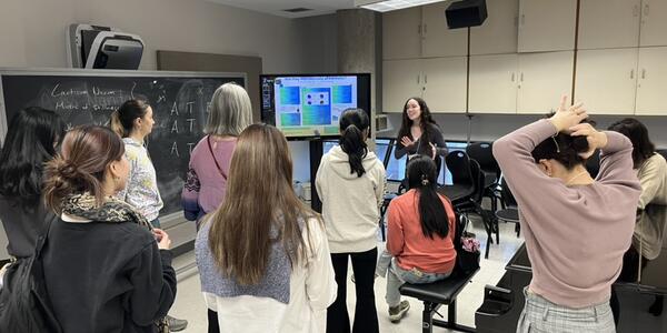 Student presenting their work to audience