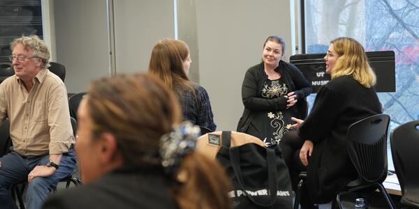 small group of students discuss