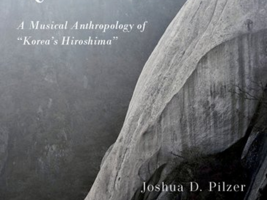 Book cover featuring a black-and-white image of a cliff as the background, with the title prominently displayed in bold lettering over the image.