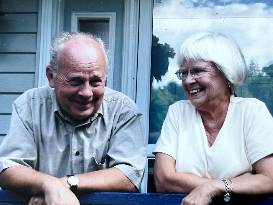 A candid image of Timothy and Bonnie McGee laughing at some unknown joke
