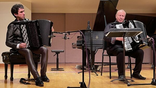 Michael Bridge and Joseph Macerollo play accordions in Walter Hall